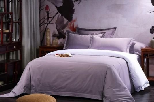 宾馆里床上的一块布有什么用,酒店床上的布条是干什么用的图7