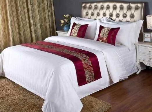 宾馆里床上的一块布有什么用,酒店床上的布条是干什么用的图3